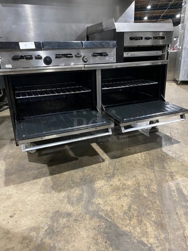 GREAT FIND! Garland Commercial Gas Powered 6 Burner Stove With Right Side Flat Griddle! Griddle Has Side Splashes! With Raised Back Splash And Salamander Shelf! With 2 Oven Underneath! Metal Oven Racks! All Stainless Steel! On Casters! Working When Removed! - Image 9 of 12