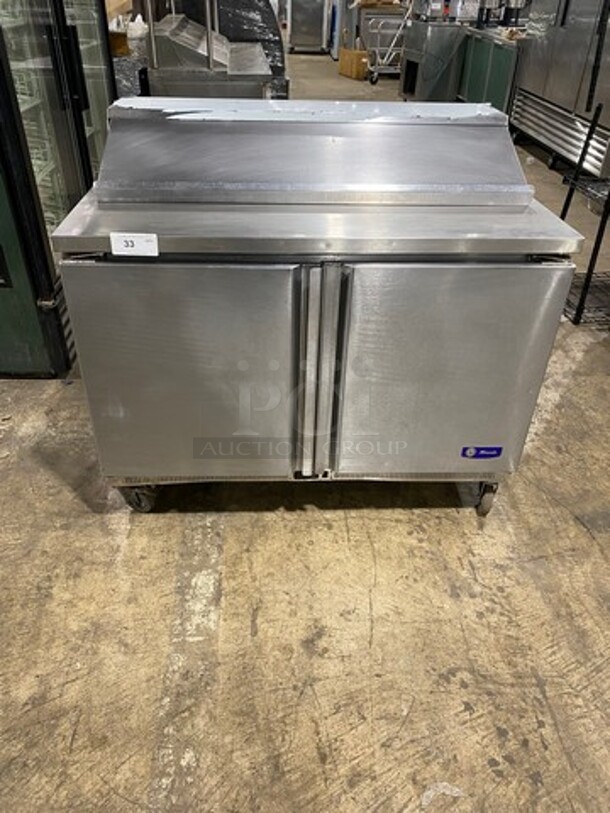 Migali Commercial Refrigerated Mega Top Sandwich Prep Table! With 2 Door Storage Space Underneath! Poly Coated Racks! All Stainless Steel! On Casters! Model: G3SP4812 SN: 10120088M 115V 60HZ 1 Phase