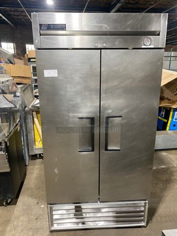 True Commercial 2 Door Reach In Freezer! With Poly Coated Racks! All Stainless Steel! On Casters! Model: T35F SN: 14308214 115V 60HZ 1 Phase