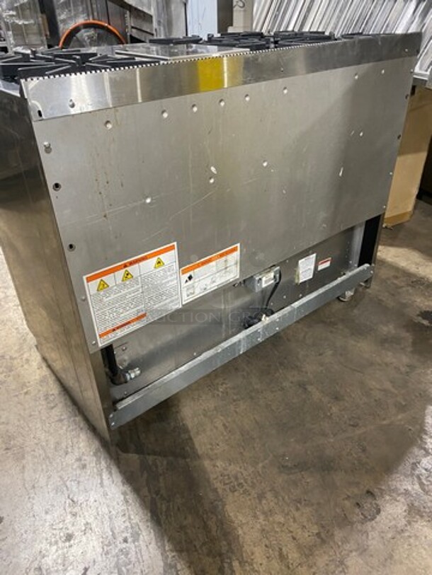 AMAZING! ALL ONE MONEY! Wolf Commercial Gas Powered 6 Burner Stove! With Center Mini Flat Top Griddle! With 1 Full Size & 1 Mini Oven Underneath! With Ventilation Hood System! All Stainless Steel! - Image 4 of 12