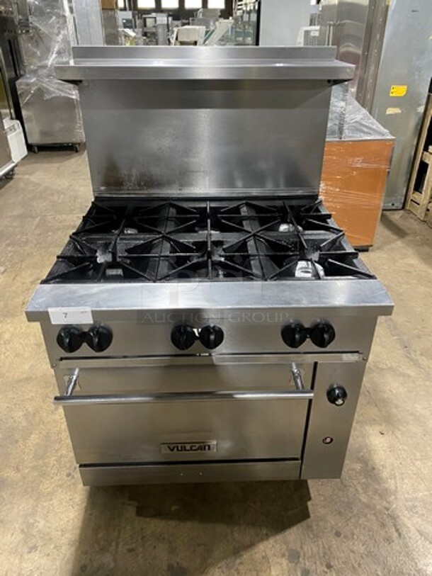 Vulcan Commercial Natural Gas Powered 6 Burner Stove! With Raised Back Splash And Salamander Shelf! With Oven Underneath! All Stainless Steel! Model: 36S6BN SN: 481938247 - Image 1 of 9