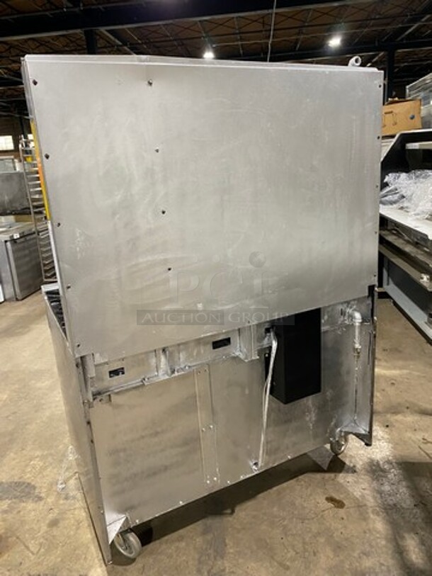 Garland Commercial Gas Powered 8 Burner Stove! With Raised Back Splash And Salamander! With Oven Underneath! All Stainless Steel! On Casters! - Image 4 of 12