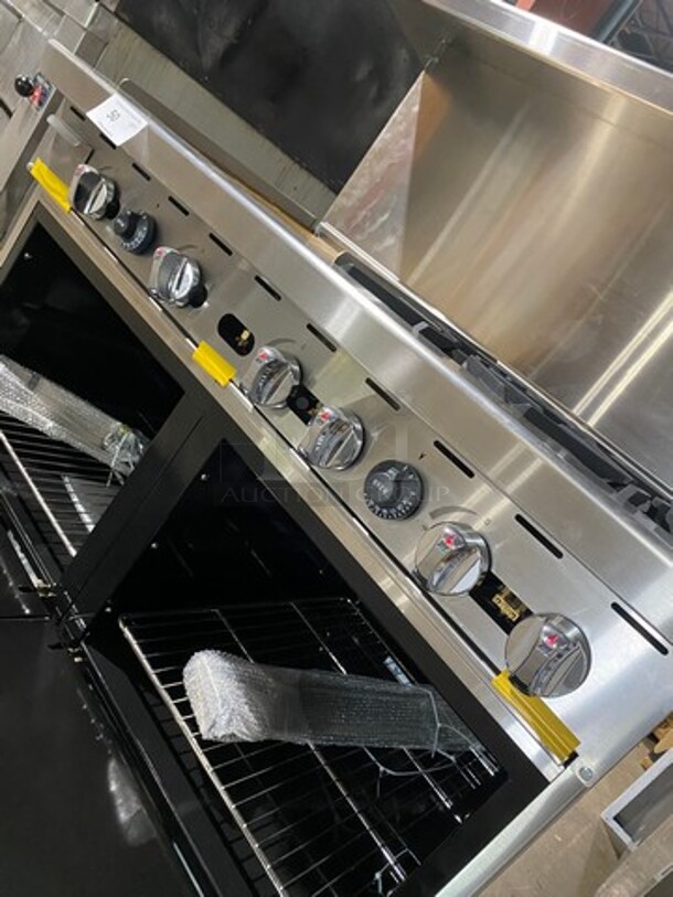 AWESOME! NEW! Migali Commercial Natural Gas Powered 4 Burner Stove With Flat Griddle! Flat Griddle Has Side Splashes! With Raised Back Splash And Salamander Shelf! With 2 Oven Underneath! Metal Oven Racks! All Stainless Steel! On Casters! Model: CRO424GLNG SN: NGUSB100321071000920017 - Image 10 of 12