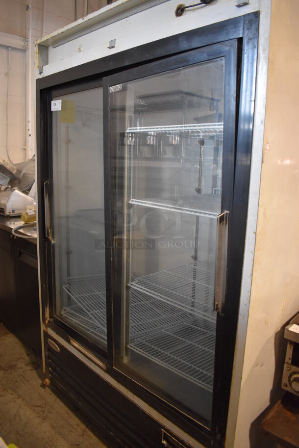 Serv-Ware GR-48S Metal Commercial 2 Door Reach In Cooler Merchandiser w/ Poly Coated Racks. 115 Volts, 1 Phase. 55x31x82. Cannot Test Due To Cut Power Cord