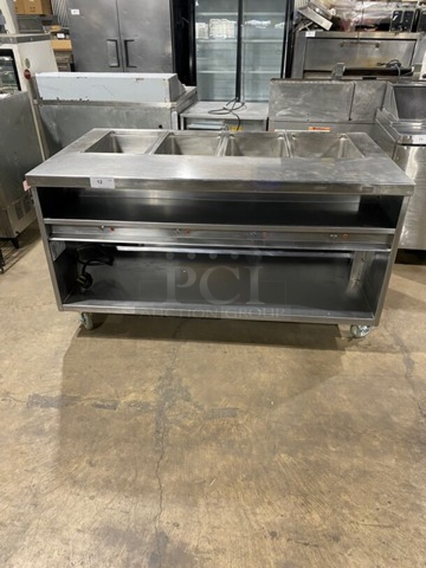 Delfield Commercial Electric Powered 4 Well Steam Table! With Storage Space Underneath! All Stainless Steel! On Casters! Model: F14EI460 SN: 1010150000316 208/230V 60HZ 1 Phase