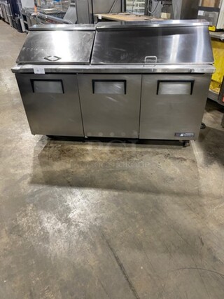 True Commercial Refrigerated Sandwich Prep Table! With 3 Door Storage Space Underneath! Poly Coated Racks! All Stainless Steel! On Casters! Model: TSSU7218 SN: 14477571! 115V 60HZ 1 Phase!