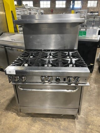GREAT! Southbend Commercial Natural Gas Powered 6 Burner Stove! With full Sized Oven Underneath! With Backsplash & Overhead Salamander Shelf! All Stainless Steel! With Metal Oven Racks! On Legs! Model: 4361D SN: 11A17770!