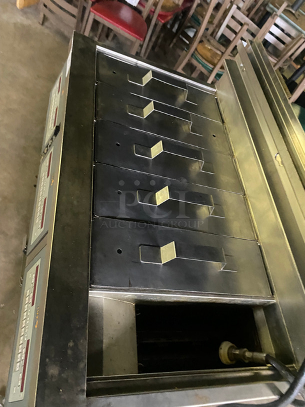 Amazing! Henny Penny Commercial Natural Gas Powered 6 Section/Bay Deep Fat Fryer! With Oil Filter System! With Fryer Covers! All Stainless Steel! On Casters! Model: LVG103SSS SN: BU1108022 120V 60HZ 1 Phase! - Image 5 of 12