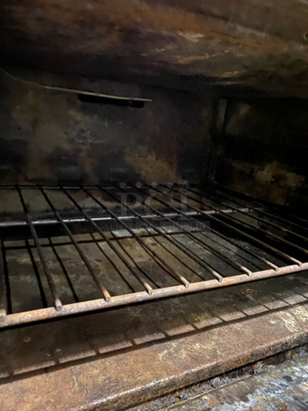 Vulcan Commercial Natural Gas Powered 10 Burner Stove! With 2 Full Size Oven Underneath! Metal Oven Rack! With Raised Back Splash And Salamander Shelf! All Stainless Steel! - Image 8 of 9