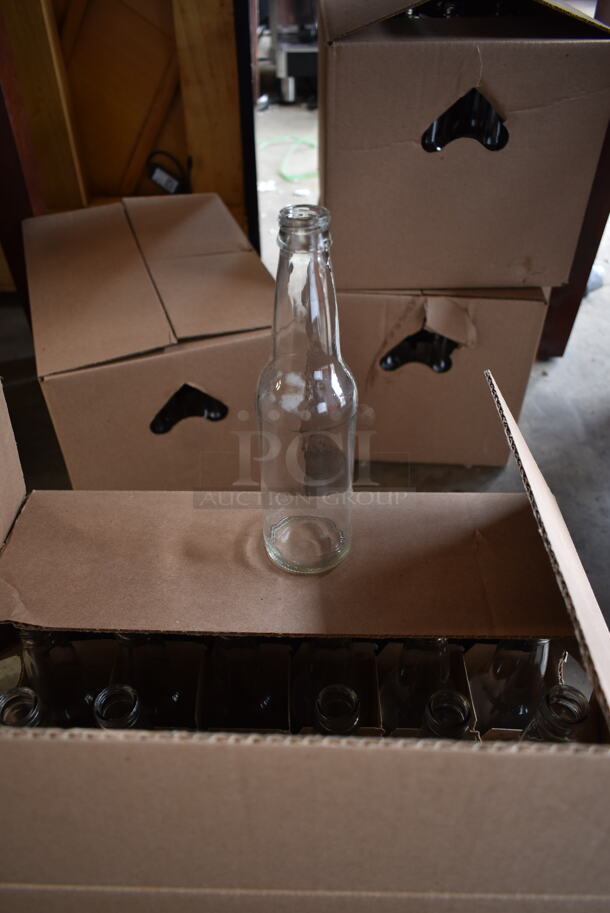 4 Boxes of 24 Glass Bottles. 4 Times Your Bid!