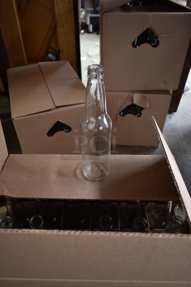4 Boxes of 24 Glass Bottles. 4 Times Your Bid! - Image 1 of 3