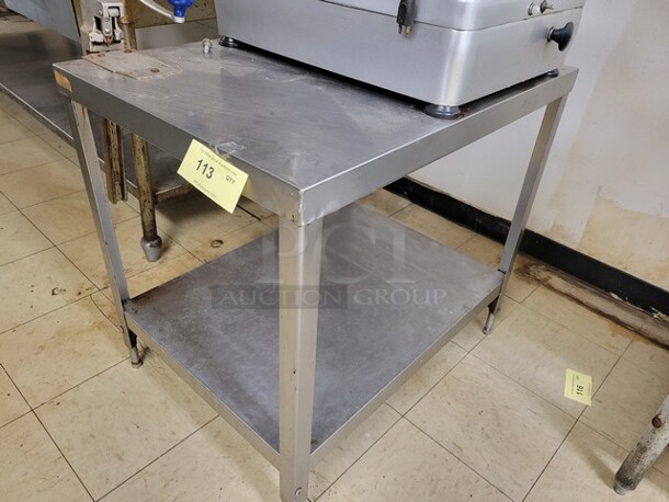Stainless Steel Work Table w/ Can Opener

*Contents on top of table not included! - Image 2 of 2
