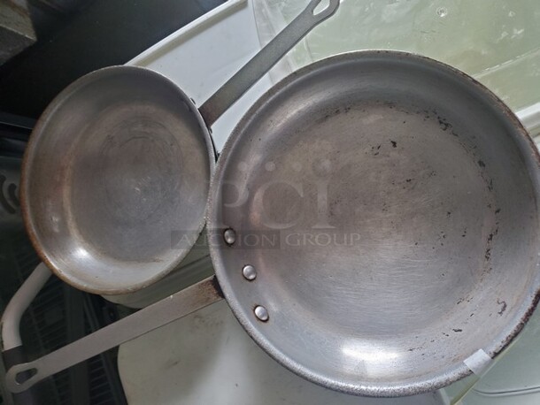 ALL ONE MONEY 2 Fry pan w/ handle.