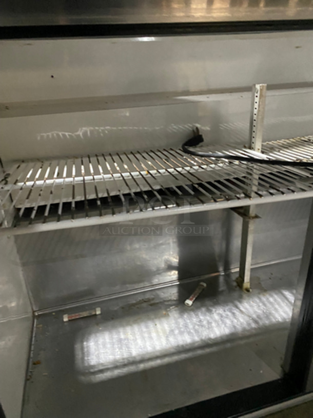 True Commercial Refrigerated Sandwich Prep Table! With 2 Door Storage Space Underneath! Poly Coated Racks! All Stainless! On Casters! Model: TSSU4812 SN: 4946429 115V 60HZ 1 Phase - Image 6 of 11