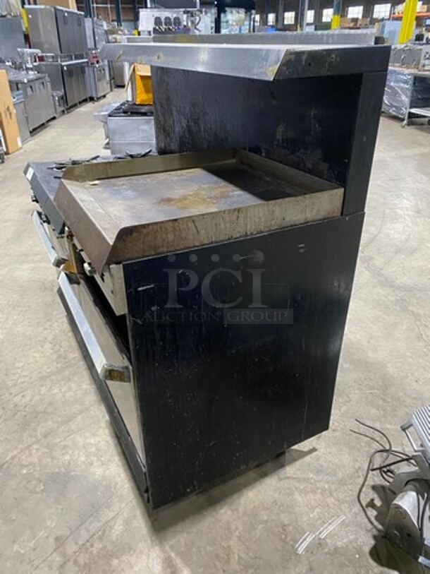 Garland Commercial Natural Gas Powered 6 Burner Stove With Right Side Flat Griddle! Griddle Has Side Splashes! With Raised Back Splash And Salamander Shelf! With 2 Oven Underneath! Metal Oven Racks! All Stainless Steel! On Legs! Working When Removed! - Image 2 of 9