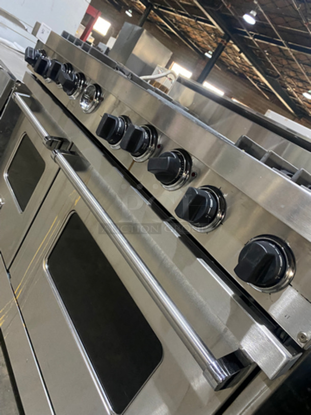AMAZING! Viking Duel Fuel Powered 4 Burner Stove! With Built In Flat And Ribbed Griddle! With 2 Oven Underneath! Metal Oven Racks! All Stainless Steel! On Legs! - Image 11 of 12