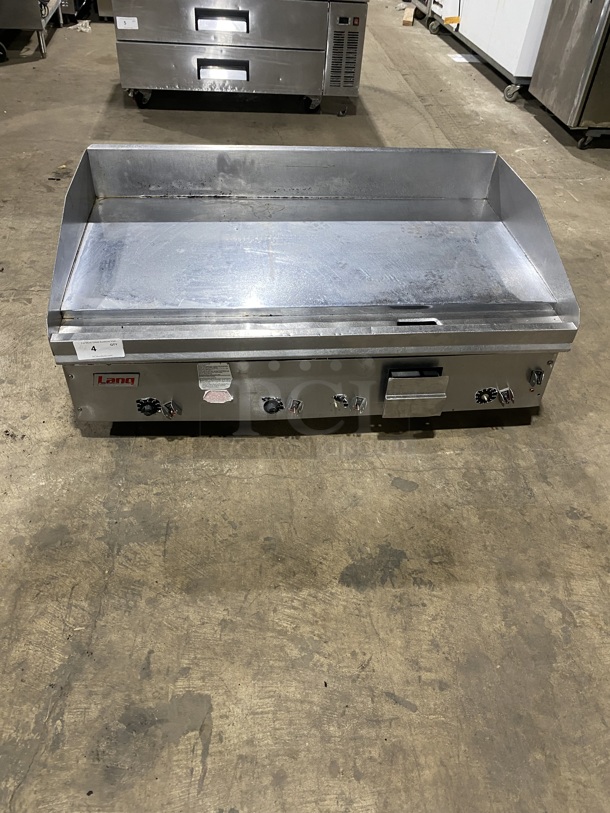 Lang Commercial Countertop Natural Gas Powered Mirror Shine Polish Top Flat Top Griddle! With Back And Side Splashes! All Stainless Steel! On Small Legs! Working When Removed! - Image 1 of 9