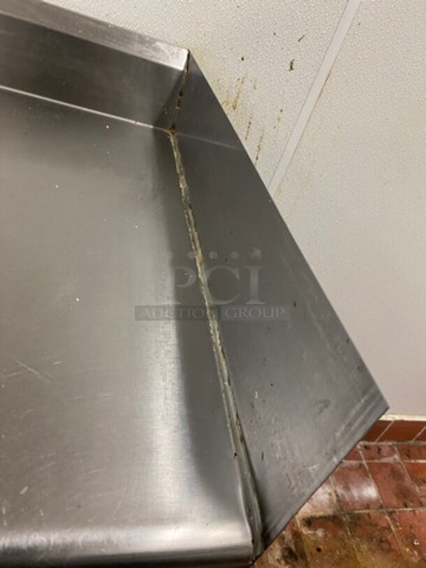 Solid Stainless Steel Side Dishwasher Table! With Back And Single Side Splash! With Storage Space Underneath! On Legs! - Image 4 of 7