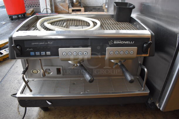 Nuova Simonelli Arcadia Stainless Steel Commercial Countertop 2 Group Espresso Machine / 3 Portafilters and 2 Steam Wands. 208 Volts, 1 Phase. 31x24x24 - Image 1 of 8