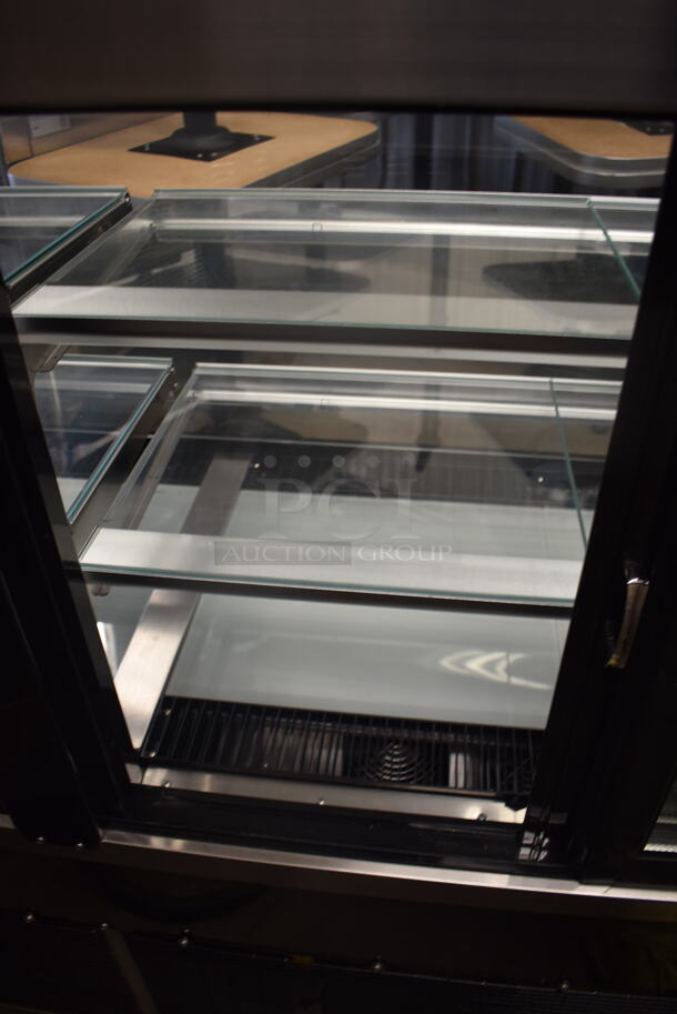 BRAND NEW SCRATCH AND DENT! Avantco BC-72-HC 72" Curved Glass Black Refrigerated Bakery Display Case on Commercial Casters. Missing Side Glass. 115 Volt 1 Phase. Tested and Working! - Image 7 of 12