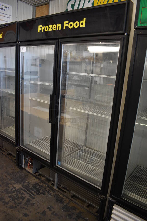 2013 True Model GDM-49F-LD ENERGY STAR Metal Commercial 2 Door Reach In Freezer Merchandiser w/ Poly Coated Racks. 115 Volts, 1 Phase. 54x30x79. Cannot Test Due To Missing Power Switch