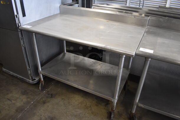Stainless Steel Commercial Table w/ Under Shelf and Back Splash on Commercial Casters. 48x30x40 - Image 2 of 4