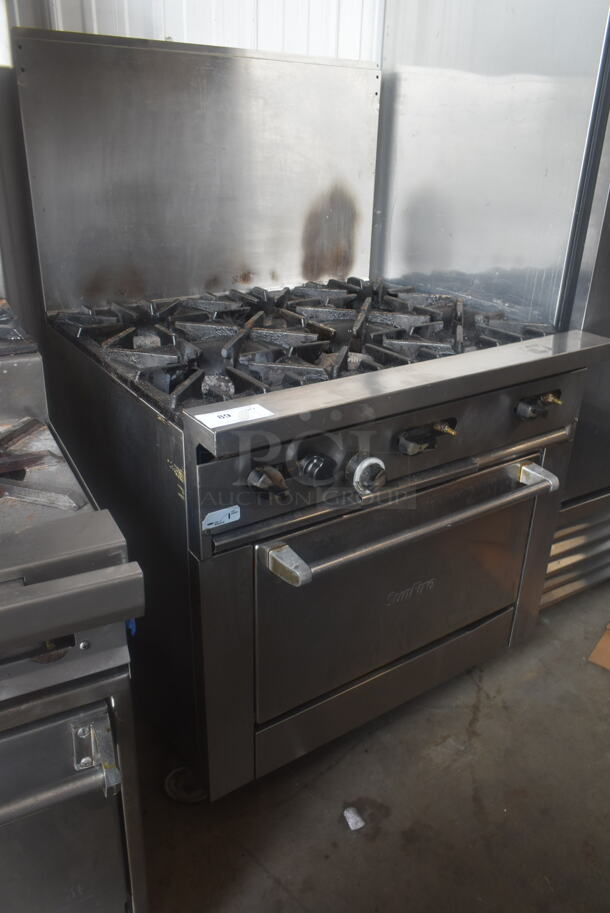Garland SunFire Stainless Steel Commercial Natural Gas Powered 6 Burner Range w/ Oven and Back Splash on Commercial Casters.  - Image 1 of 8