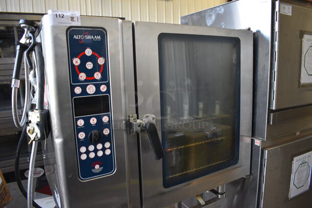 Alto Shaam Model 10.10 MI Stainless Steel Commercial Electric Powered Combitherm Convection Oven w/ View Through Door and Metal Oven Racks on Metal Stand. 208-240 Volts, 3 Phase. 40x30x66 - Image 2 of 8