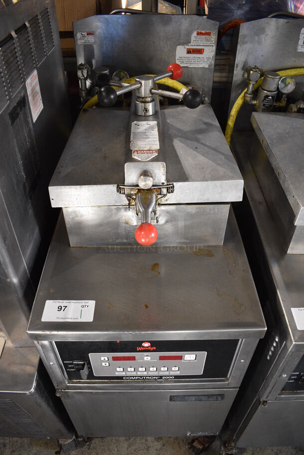 2016 Henny Penny 600C Stainless Steel Commercial Floor Style Natural Gas Powered Pressure Fryer on Commercial Casters. 80,000 BTU. 18x39x48 - Image 1 of 10