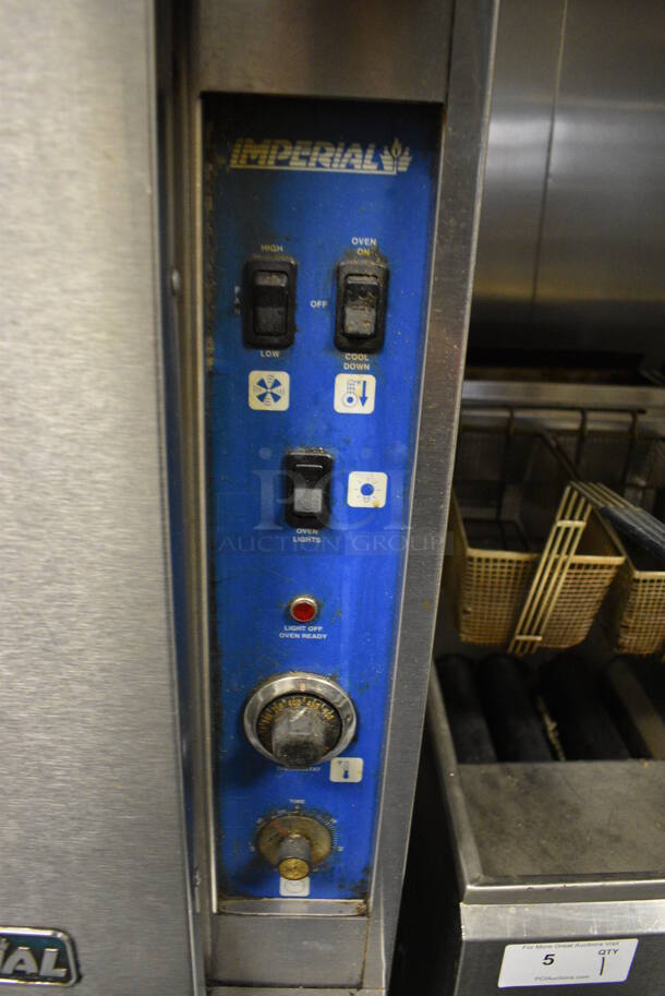 Imperial Stainless Steel Commercial Gas Powered Full Size Convection Oven w/ View Through Door, Solid Door, Metal Oven Racks and Thermostatic Controls on Metal Legs. 36x41x61. BUYER MUST REMOVE. Item Was in Working Condition on Last Day of Business. (kitchen) - Image 3 of 6