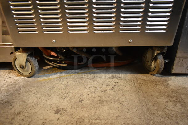 Taylor 754-33 Stainless Steel Commercial Floor Style Water Cooled 2 Flavor w/ Twist Soft Serve Ice Cream Machine on Commercial Casters. 208-230 Volts, 3 Phase. - Image 7 of 10