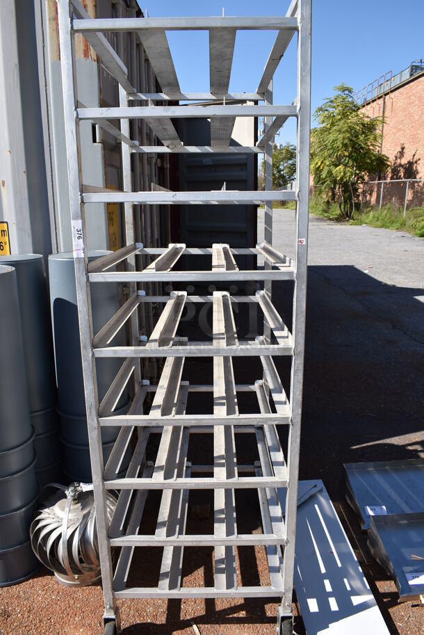 Metal Commercial Rack on Commercial Casters. 25.5x35.5x82