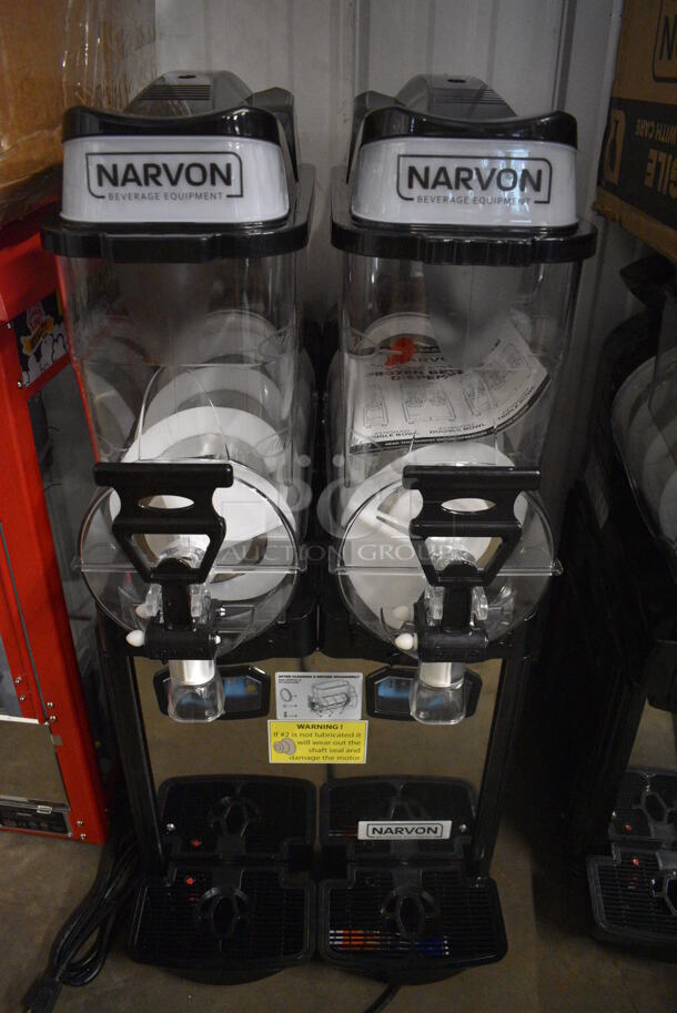 BRAND NEW IN BOX! Narvon Model OASIS 2-10 Metal Commercial Countertop 2 Hopper Slushie Machine. Each Hopper Has 2.6 Gallon Capacity. 120 Volts, 1 Phase. 17x22x34. Tested and Working!