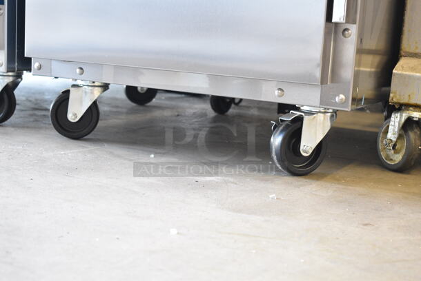 BRAND NEW SCRATCH AND DENT! 2023 Delfield 6025XL-S Stainless Steel Commercial Single Door Reach In Cooler w/ Racks on Commercial Casters. 115 Volts, 1 Phase. Tested and Working! - Image 4 of 6