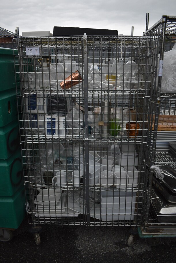 ALL ONE MONEY! Lot of Chrome Finish 5 Tier Shelving Unit on Commercial Casters w/ Liquor Cage and All Contents Including Glasses, White Ceramic Plates. BUYER MUST DISMANTLE. PCI CANNOT DISMANTLE FOR SHIPPING. PLEASE CONSIDER FREIGHT CHARGES. 38x25x68