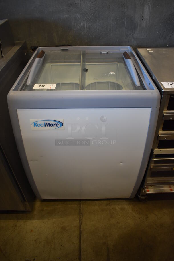 KoolMore KM-ICD-26SD Metal Commercial Freezer Merchandiser Display on Commercial Casters. 26x27x34. Tested and Powers On But Does Not Get Cold