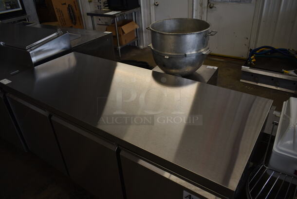 BRAND NEW SCRATCH AND DENT! 2023 Avantco 178SSUC72RHC Stainless Steel Commercial 3 Door Undercounter Cooler on Commercial Casters. 115 Volts, 1 Phase. Tested and Working! - Image 3 of 10