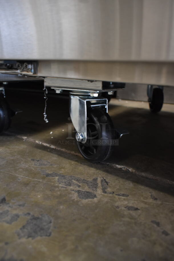 BRAND NEW SCRATCH AND DENT! 2023 Avantco 178SSUC72RHC Stainless Steel Commercial 3 Door Undercounter Cooler on Commercial Casters. 115 Volts, 1 Phase. Tested and Working! - Image 5 of 10