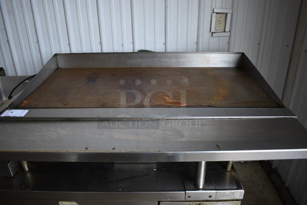 Garland Stainless Steel Commercial Countertop Natural Gas Powered Flat Top Griddle. 48x28x16