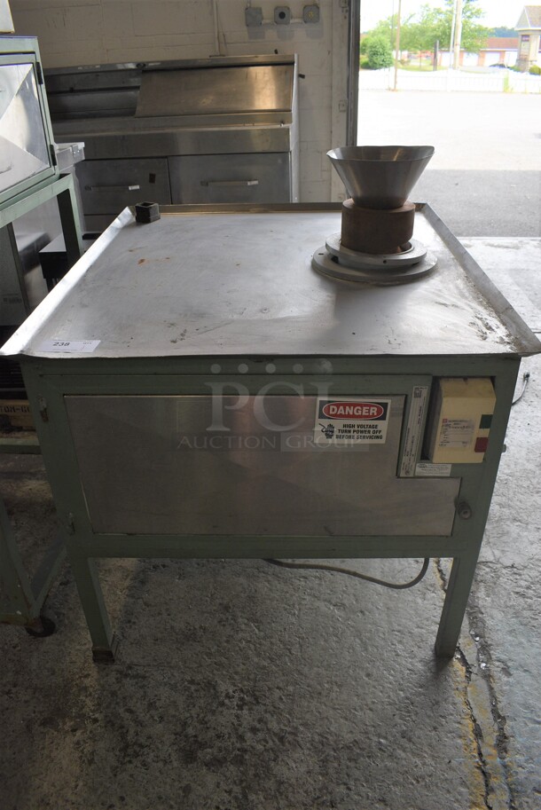 Model MQ164 Metal Commercial Floor Style Automatic Dough Rounder. 110 Volts, 1 Phase. 35.5x39.5x42. Cannot Test Due To Missing Power Cord