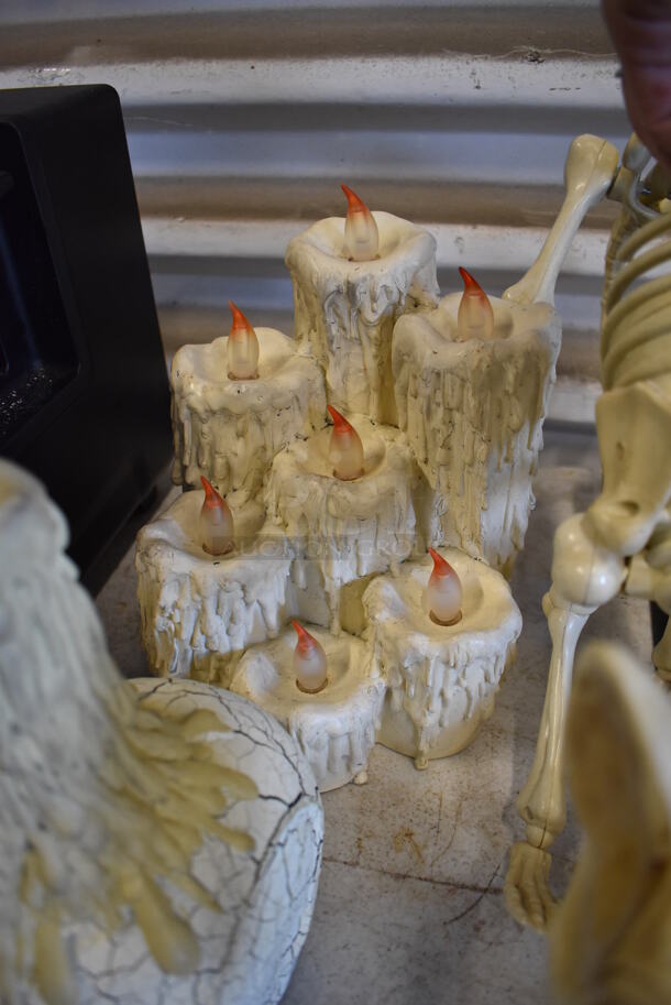ALL ONE MONEY! Lot of Hole Punch and 3 Halloween Decorations; Cat Skeleton, Head Skeleton w/ Candle and Multi Candle. Includes 13x4.5x6.5 - Image 4 of 5