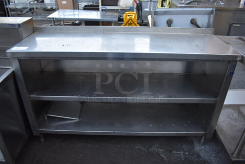 Stainless Steel Table w/ 2 Under Shelves and Back Splash. 60x18x38