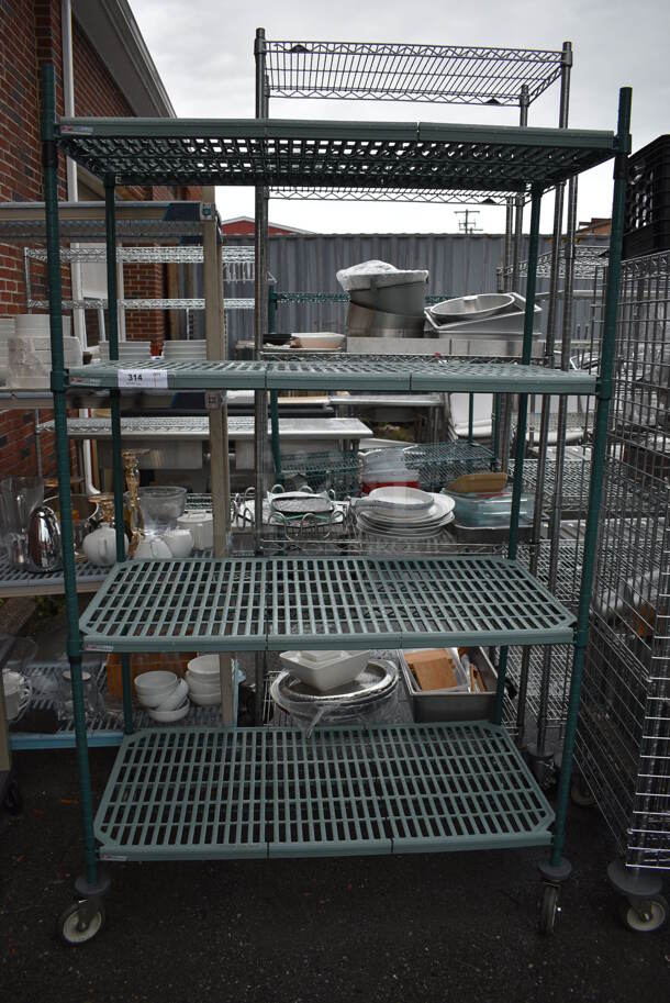 Metro Max Poly 4 Tier Shelving Unit on Commercial Casters. BUYER MUST DISMANTLE. PCI CANNOT DISMANTLE FOR SHIPPING. PLEASE CONSIDER FREIGHT CHARGES. 48x24x80