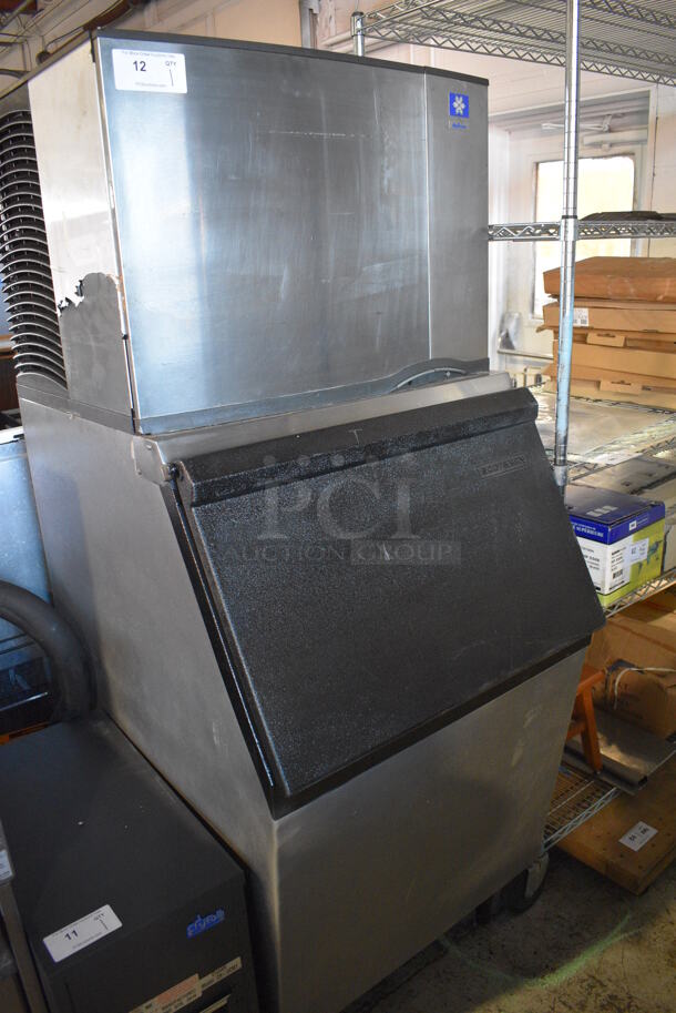 Manitowoc Model SD0503W Stainless Steel Commercial Ice Machine Head on Commercial Ice Machine Bin. 115 Volts, 1 Phase. 30x36x73