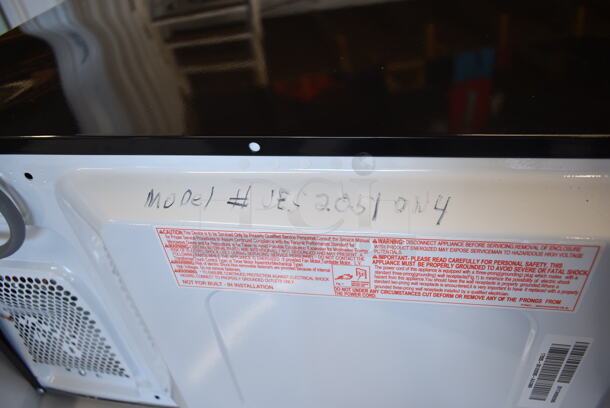 BRAND NEW SCRATCH AND DENT! JES2051ON4 Metal Countertop Microwave Oven. - Image 5 of 6