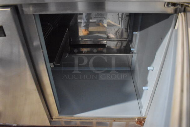 2010 Delfield 4472N-30M-AS Stainless Steel Commercial Prep Table w/ 3 Lids on Commercial Casters. 115 Volts, 1 Phase. 72x35.5x36. Tested and Working! - Image 3 of 9