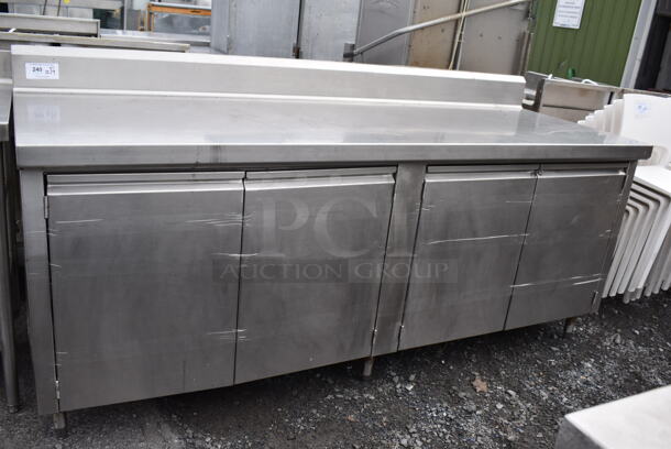 Stainless Steel Counter w/ 4 Doors and Back Splash. 88x32x42.5