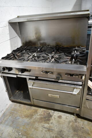 Garland Stainless Steel Commercial Natural Gas Powered 8 Burner Range w/ Convection Oven, Over Shelf and Back Splash.
