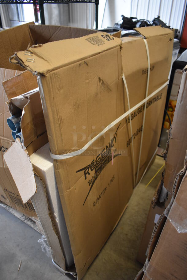 BRAND NEW SCRATCH AND DENT! Regency 600T2424G Stainless Steel Table - Image 2 of 5