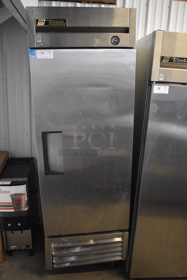 2013 True T-23F ENERGY STAR Stainless Steel Commercial Single Door Reach In Freezer w/ Poly Coated Racks on Commercial Casters. Missing 1 Caster. 115 Volts, 1 Phase. Tested and Working!